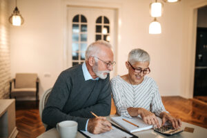 senior couple calculating their finances