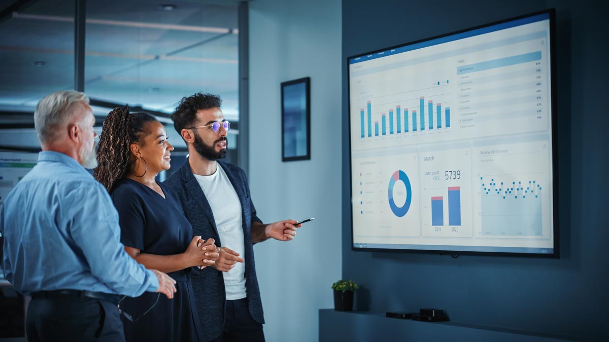 Business team reviewing sales forecasting
