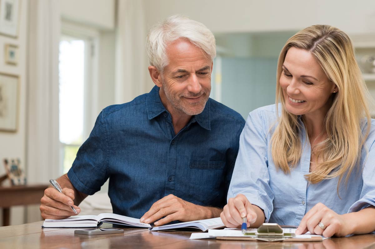 Couple getting ahead of budgeting for retirement together