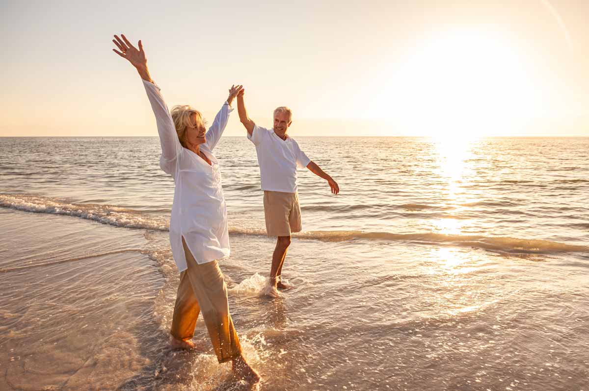 Senior couple enjoying their retirement on the beach