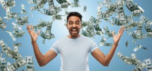 A young man overtaken with the excitement of winning the lottery, not yet aware of the difference between lottery lump sum vs. annuity decision he will soon be faced with.