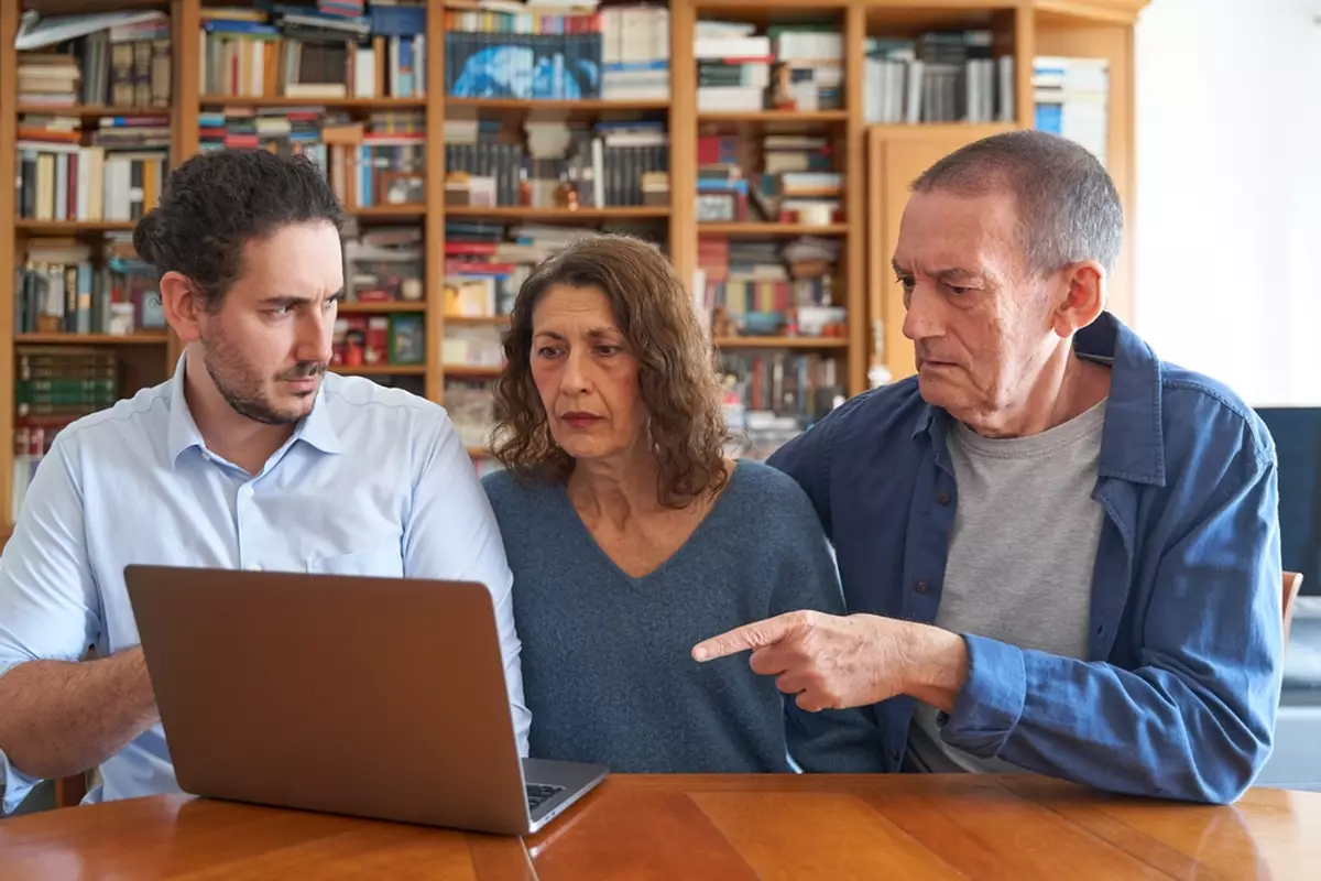 Elderly parents look on bewildered as their grown child points out they’ve fallen for one of many retirement myths.